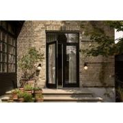 Nuura Aps Nuura utomhusvägglampa Liila, bredd 16 cm, svart/opal