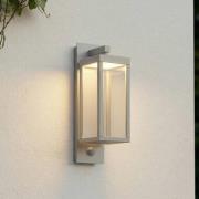 Lucande LED-utomhusvägglampa Ferdinand, ljusgrå, sensor