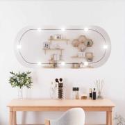 vidaXL Väggspegel med LED-belysning 45x100 cm glas oval