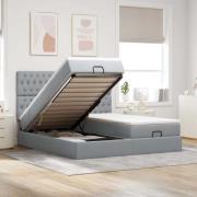 vidaXL Ottoman sängram med madrasser ljusgrå 200x200 cm tyg