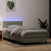 vidaXL Resårsäng med madrass och LED ljusgrå 90x210 cm sammet