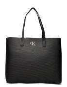 Calvin Klein Minimal Monogram Slim Tote34 T Svart