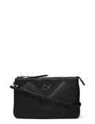 Calvin Klein Re-Lock Quilt Crossbody Svart