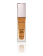 Elizabeth Arden Flawless Finish Skincaring Foundation