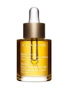 Clarins Face Treatment Oils Santal For Dry Skin And Redness Nude