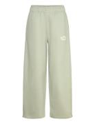 New Balance Linear Heritage Fleece Barrel Leg Pant Grön